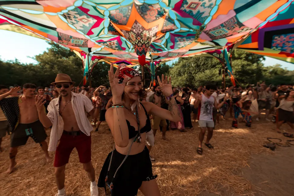 Everyone dancing together on the same floor under the KOLO canopy