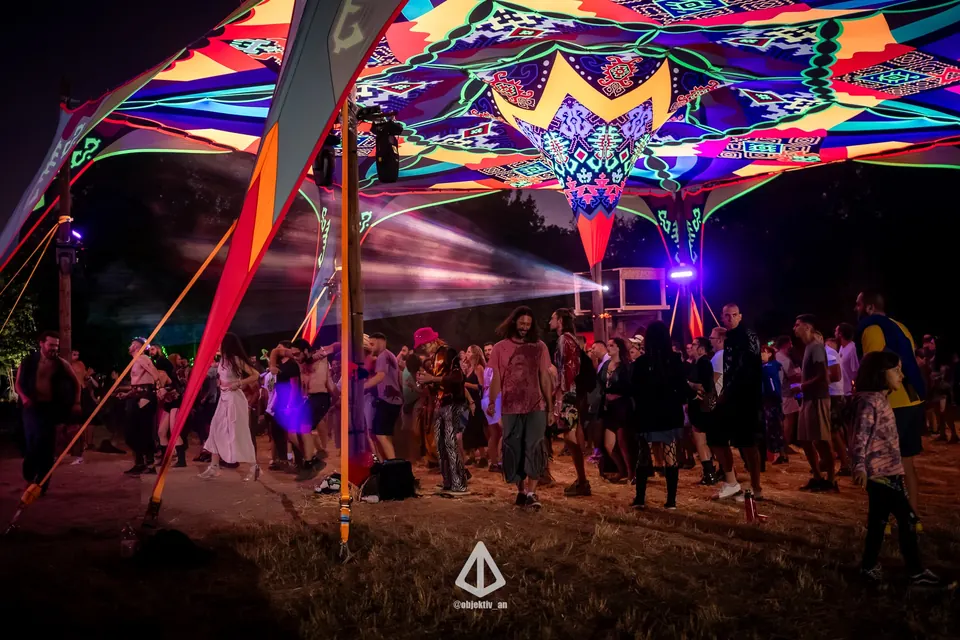 The canopy at night with lasers