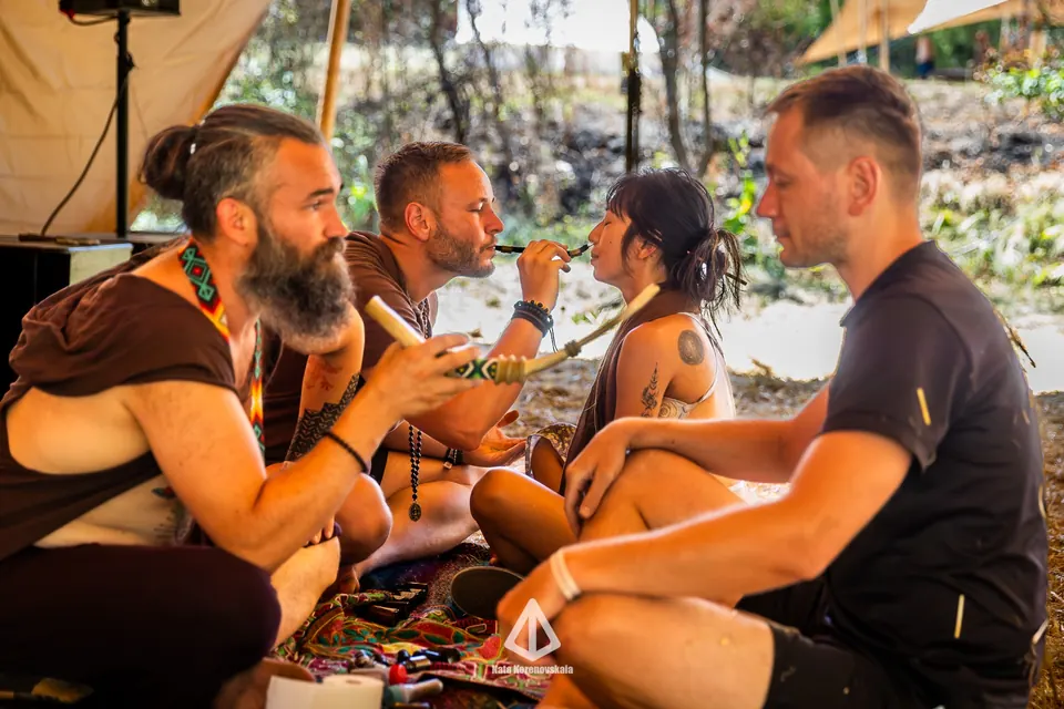 Friends sharing food in the camp
