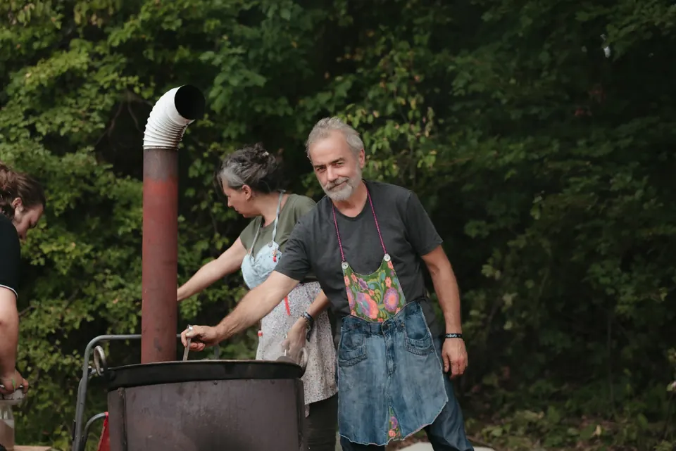 Cooking on a wood stove in the camp