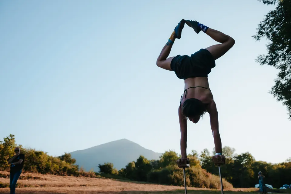 A handstand with Rtanj in the distance