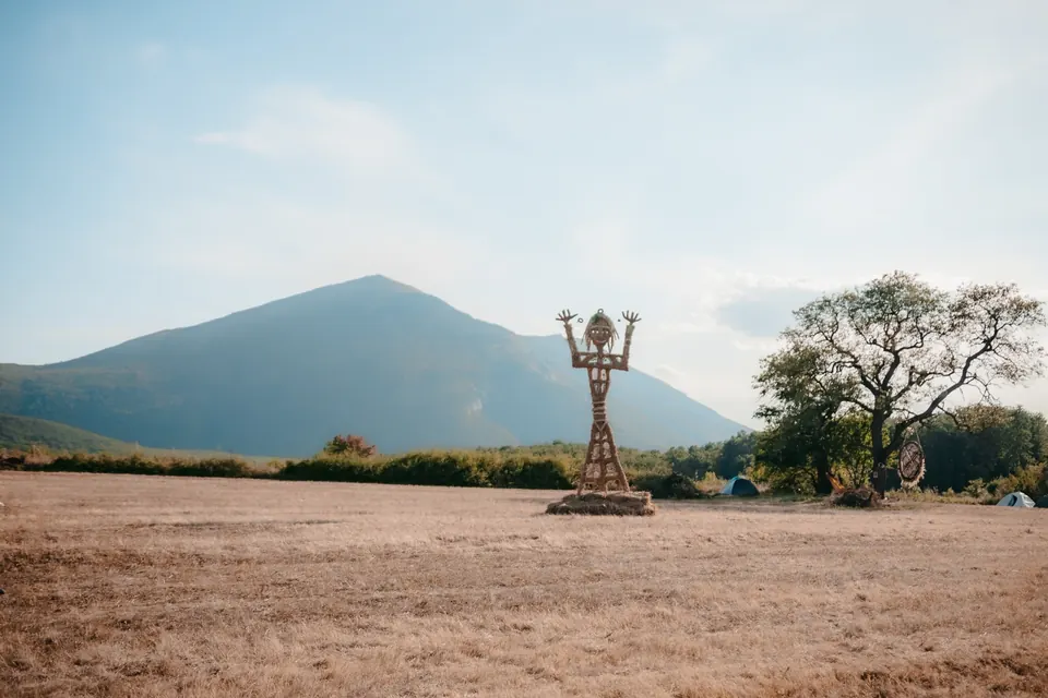 A sculpture on the meadow facing Rtanj