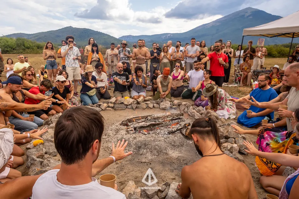 An opening circle on the meadow with Rtanj behind