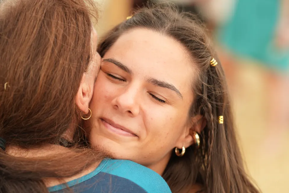 A close embrace with eyes closed