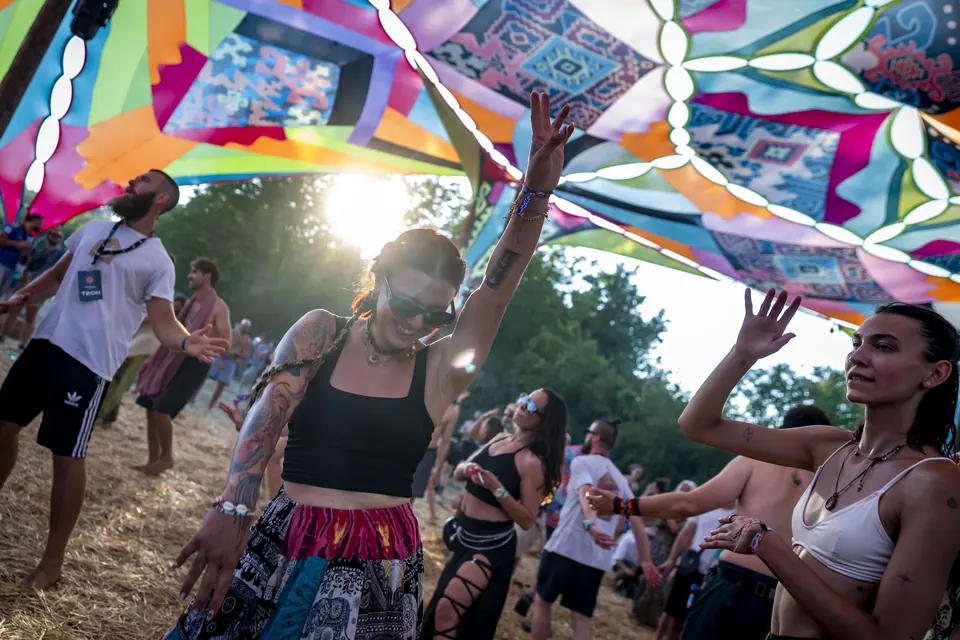 Dancing in the sunlight under the KOLO canopy