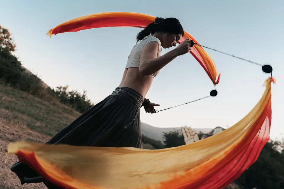 Silk poi flow on the hillside