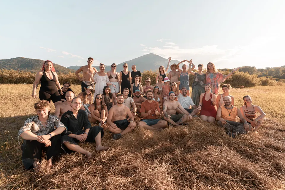 A workshop group in the meadow